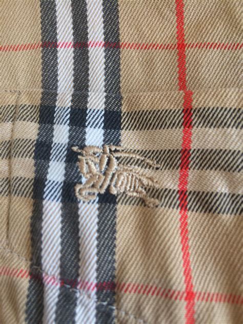 replica burberry pants|authentic burberry polo labels.